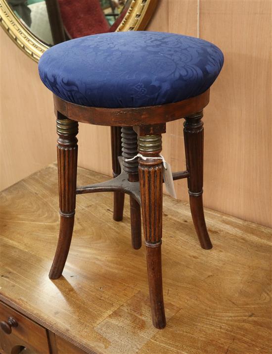 A Regency mahogany adjustable piano stool